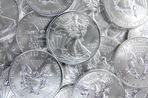 A spread of pure silver American Silver Eagle coins