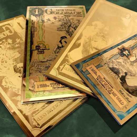 An array of Goldbacks®, showing both front and back